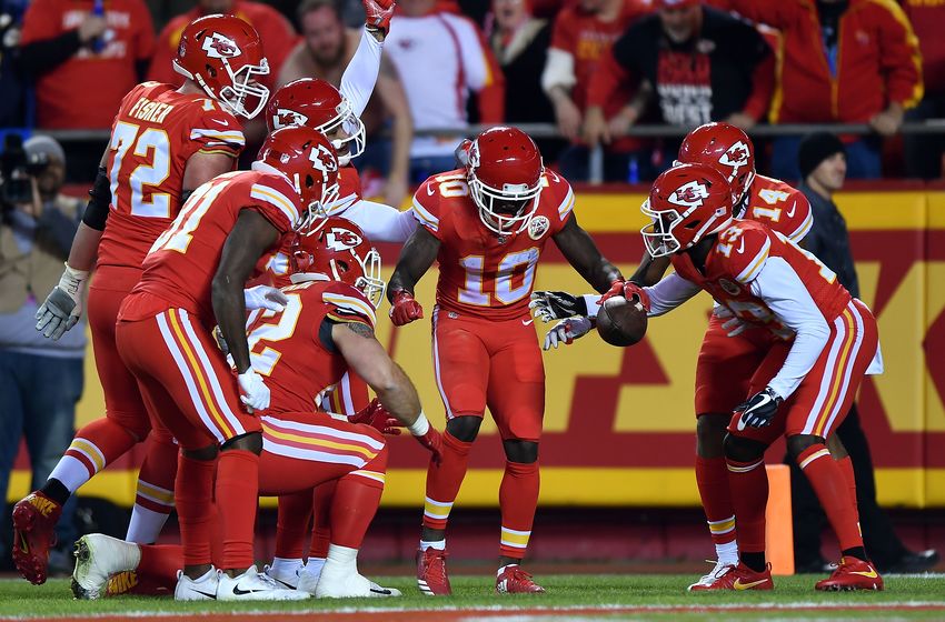 KANSAS CITY, MO - DECEMBER 16:  Wide receiver Tyreek Hill #10 of the Kansas City Chiefs celebrates with teammates in the endzone after scoring a touchdown during the game against the Los Angeles Chargers at Arrowhead Stadium on December 16, 2017 in Kansas City, Missouri.  (Photo by Peter Aiken/Getty Images)